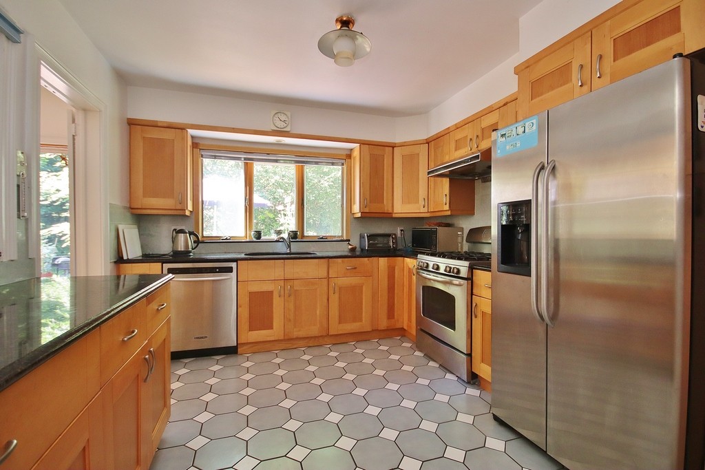 Stainless appliances and bay window in Kitchen